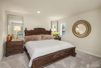 One of three additional spacious bedrooms on the second floor