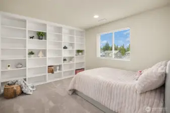 Another bedroom with built-in cabinets