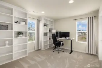 Third bedroom on the second floor with built-in cabinets is currently used as an office.