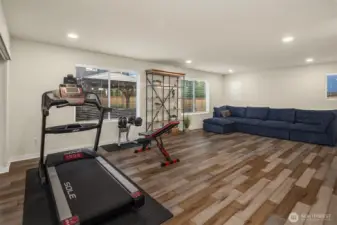 Daylight basement with tall ceilings could be a wonderful place to stay for friends and family or used as exercise/rec room.