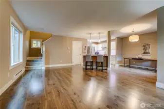 View of the living room and kitchen from entry