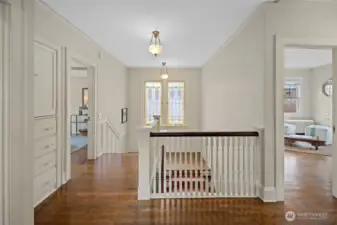 Each of the four bedrooms and the upstairs bath open onto the spacious and bright second-floor landing. Wake to sunlight streaming through the stained glass.