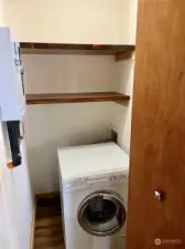 Main level washer dryer closet.