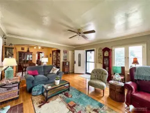 Classic hardwoods carry throughout home with timeless built-ins and archways