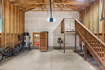 A tall covered garage is perfect for oversized vehicles.  The homeowners have also installed an RV dump and hook up to the septic for easy maintenance.