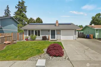 The attention to detail in this home is amazing; even curb strips for easy mowing in the front lawn. Alongside the garage there is additional parking space which can accommodate extra cars, or your small trailer or boat. It's securely gated to allow easy access of toys or vehicles.