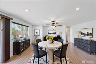 Virtually staged family room w/ eating space off kitchen