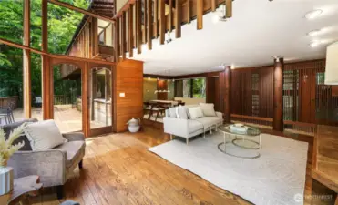 The view towards the entry (beyond the slatted wall) and dining area.
