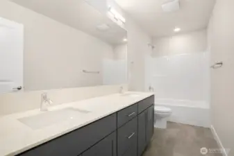 Secondary Bath has 2 sinks and plenty of counter space!