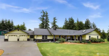 Single-level living with NO steps for entry. Two car attached garage with shop space. Several French drains around property to divert water. Thick attic insulation blankets and solar fans to air out attic space.