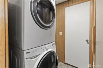 Large laundry room that opens to the fenced back yard