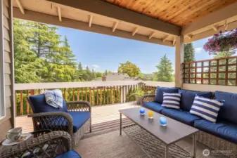 Step out from the nook to a covered deck, perfect for morning coffee or evening relaxation."
