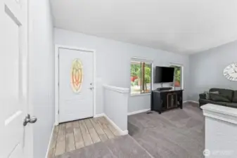 Front entry open to formal living room