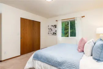 Primary Bedroom facing spacious Walk-In Closet.