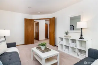 Generously sized Bonus Room has double doors that open to the upstairs hallway.