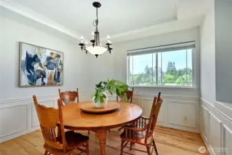 The dining room is elegant, with a cocktail counter and storage.