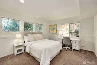 The second bedroom looks out over the front of the home.
