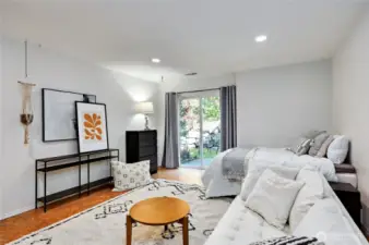 The fourth bedroom has been used as a teen studio/bedroom! The flex space could be a large bonus room, guest studio... you decide. Slider to private patio!