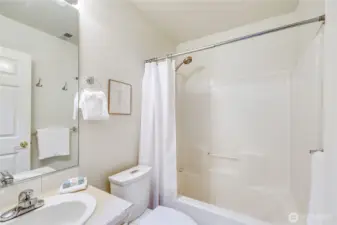 The downstairs full bathroom.