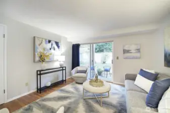 From this angle, you can see through the sliders out onto the patio and the lush back yard.  Imagine relaxing with a cup of coffee, checking your emails in the morning, or with a cool drink and enjoying the company of friends in the evening.