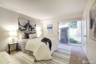 This may be the quietest bedroom in the entire complex since it is at the back of the home, at the back of the building (which is set way back from NE 124th Street), and looks out only at nature.