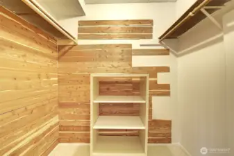 This huge partially cedar-lined walk-in closet is in the bedroom.  Imagine your clothing for all seasons fitting easily in here.