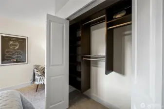 2nd bedroom closet with closet organizers