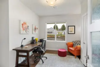 Conveniently located through custom french doors off the living area, this room gives you options; an office or a den?