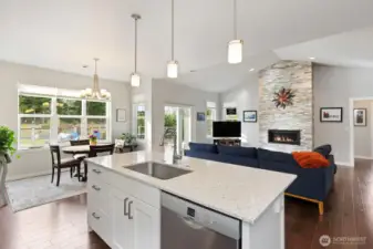 What's not to love about this huge kitchen island, perfect for meal prep or a casual gathering, with quartz counter and upgraded Bosch dishwasher.