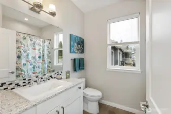 The fabulous full bath is perfect for guests!