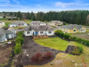 From above, this beautiful setting is on display! So many options including gardening and recreation can be yours!