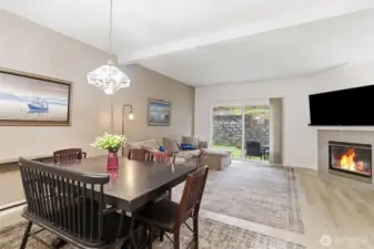 Dining area with roomy living room and private patio.