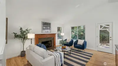 Light filled Great room leading to patio. Interior is freshly painted.