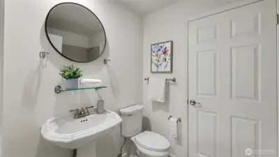 The two secondary bedrooms are served by this full hall bath. Door leads to washer/dryer room.