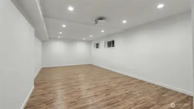 Downstairs rec room/media room is pre-wired for surround sound and projector.
