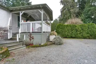 Covered porch. Heat pump. Plenty of parking.