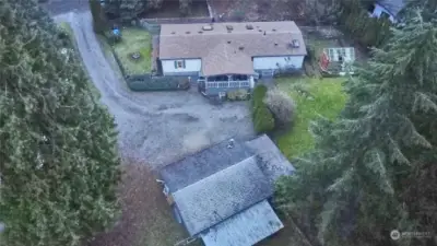 Aerial view of home and shop/garage.