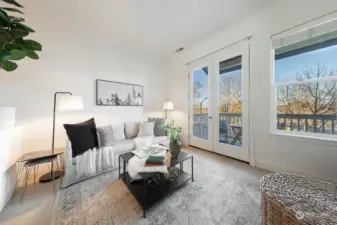 Living room open to big covered deck.