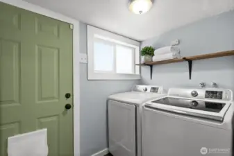 Laundry room, door leads to the backyard/deck.