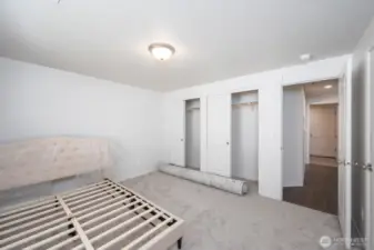 Double sliding closets + a third closet in the Primary!
