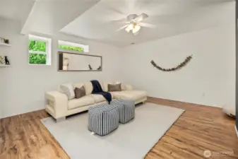 Large downstairs space has so many options! Could be a family room or separate living space.