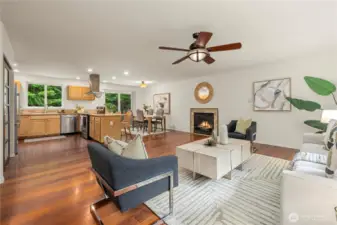 Enjoy an open layout living space with large kitchen w/ counter seating, living room, and dining room. All parts of the living area can enjoy the updated gas fireplace and views of the surrounding trees!