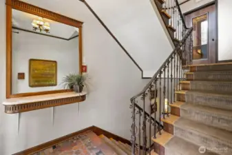 Wrought iron railing staircase.