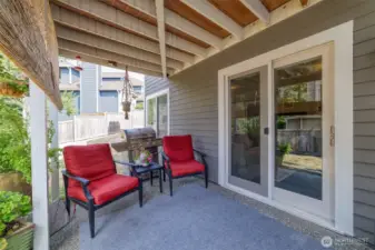 Covered patio provides a peaceful retreat with year-round dry outdoor space, thanks to the deck’s built-in gutter system
