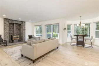 Open concept family room flows into the breakfast nook and kitchen, or step out to the back deck