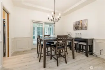 Dining room has direct access to the kitchen, sunroom and living room - perfect for entertaining!