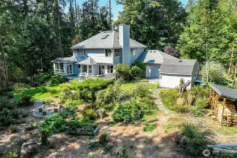 Your corner of paradise includes a serene back yard with a sunny garden