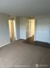 Living room towards kitchen and bedrooms