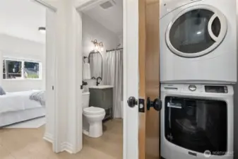 Stacking washer dryer in MIL hallway. This unit is on a separate electrical meter.