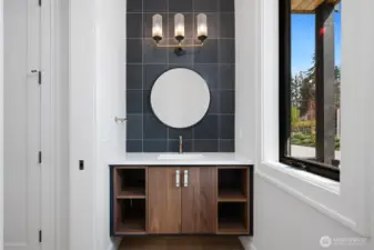 Designer touches everywhere. Floating Belmont walnut cabinet with towel pockets in powder bath on. Main.